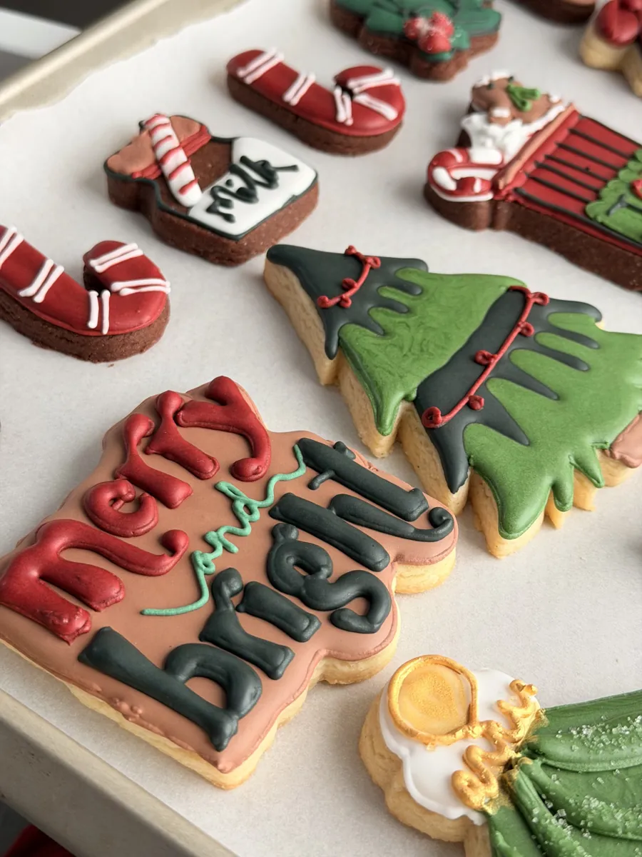 Merry and bright Christmas cookies with candy canes, tree and lettering