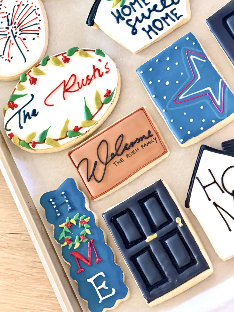 Housewarming cookies with front door, home sweet home house, welcome sign and wreath lettering